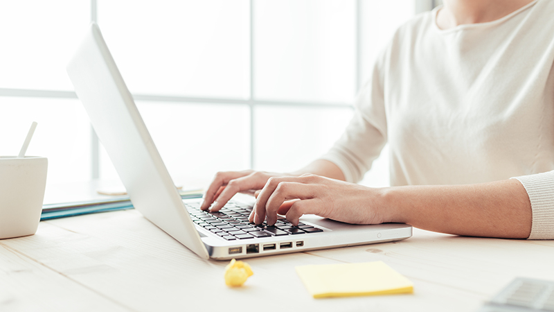 Woman working at a computer